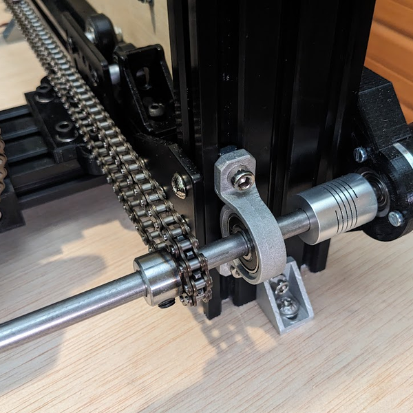Close-up of chain, shaft, bearings and force feedback transmission components