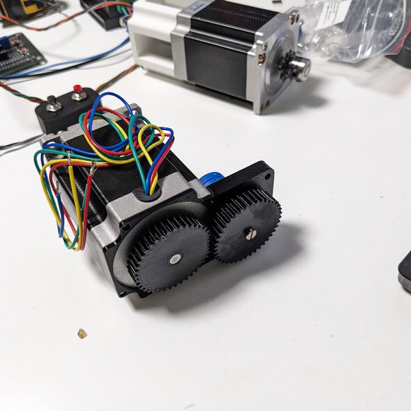 Motorized trim gear transmission on workbench